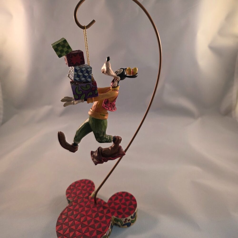 Disney Goofy with presents and stand